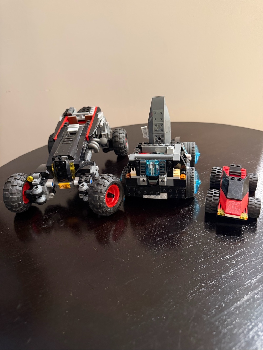 LEGO Batman Speedwagon 70905; LEGO ultra agent vehicle 70165; red LEGO car